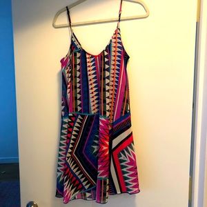 Fun summer dress. Small stain shown in picture.